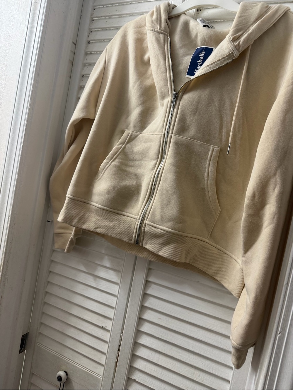 NWT cream hoodie.